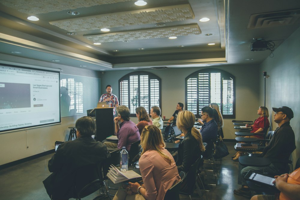 A presenter leading a workshop with participants